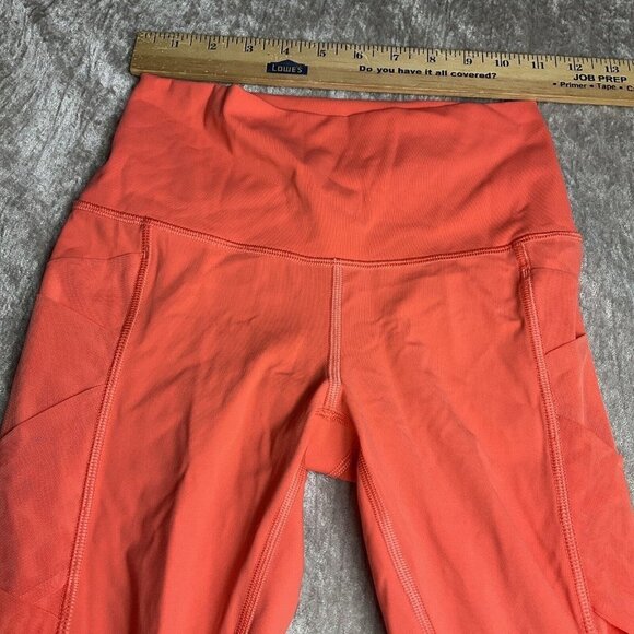 Lululemon Rise and Flow Pant Mesh Criss Cross Size 4 Orange Coral EUC - Picture 2 of 10